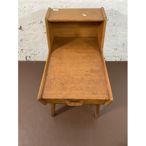 116 - A mid 20th century G Plan Brandon oak telephone table - approx. 60cm high x 59cm wide x 38cm deep