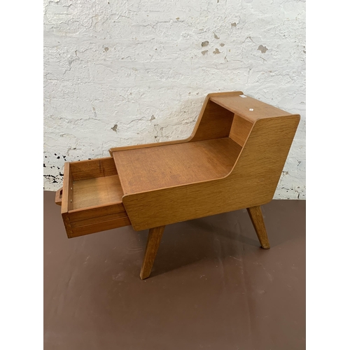 116 - A mid 20th century G Plan Brandon oak telephone table - approx. 60cm high x 59cm wide x 38cm deep