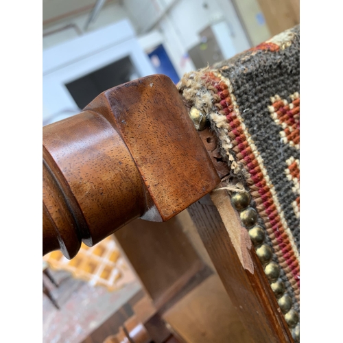 118 - A Victorian mahogany and tapestry upholstered stool