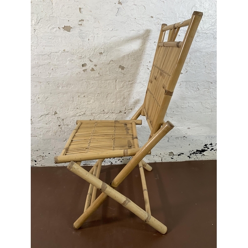 119 - A pair of bamboo folding chairs