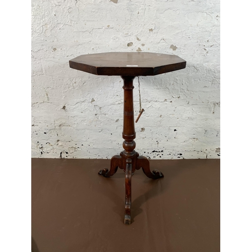 12 - A Georgian mahogany octagonal tilt top tripod occasional table - approx. 97cm high when tilted x 46c... 