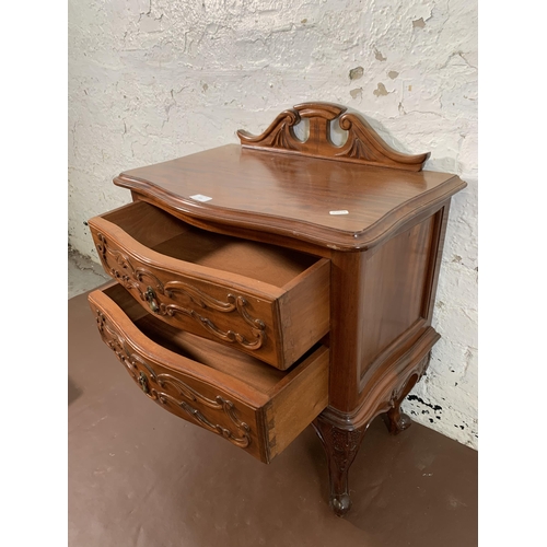 123 - A French Louis XV style carved mahogany two drawer bedside cabinet - approx. 74cm high x 60cm wide x... 