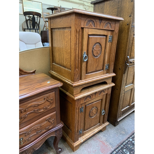 124 - A pair of 17th century style carved oak bedside cabinets - approx. 53cm high x 46cm wide x 39cm deep