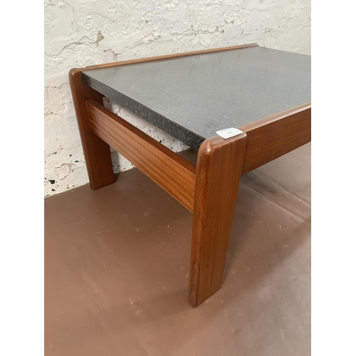 131 - A mid 20th century teak and black laminate rectangular coffee table - approx. 40cm high x 55cm wide ... 