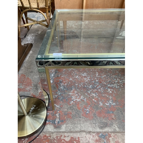 132 - A 1970s Renato Zevi brass and chromed steel coffee table with clear glass top - approx. 54.5cm high ... 