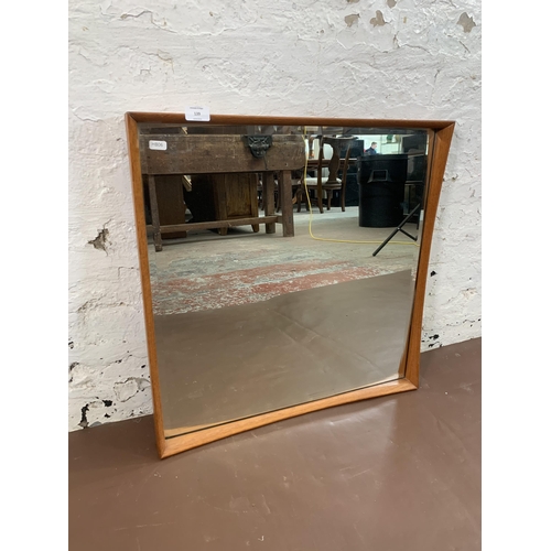 139 - A mid 20th century Danish teak framed bevelled edge wall mirror - approx. 61cm high x 60cm wide