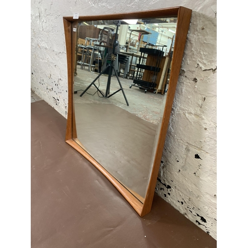 139 - A mid 20th century Danish teak framed bevelled edge wall mirror - approx. 61cm high x 60cm wide