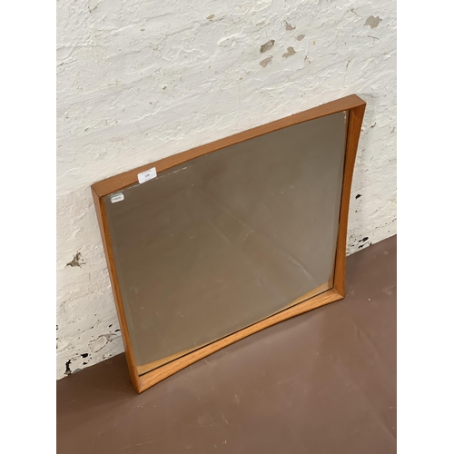 139 - A mid 20th century Danish teak framed bevelled edge wall mirror - approx. 61cm high x 60cm wide