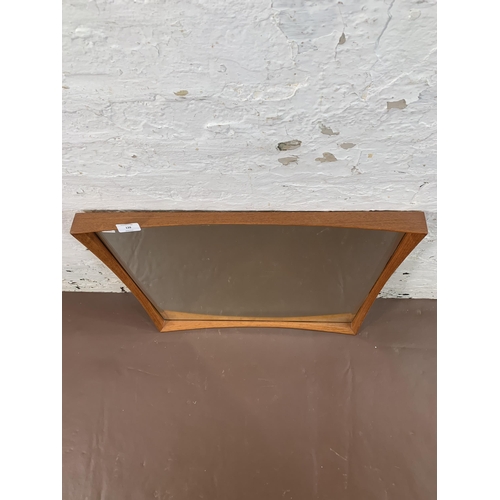 139 - A mid 20th century Danish teak framed bevelled edge wall mirror - approx. 61cm high x 60cm wide