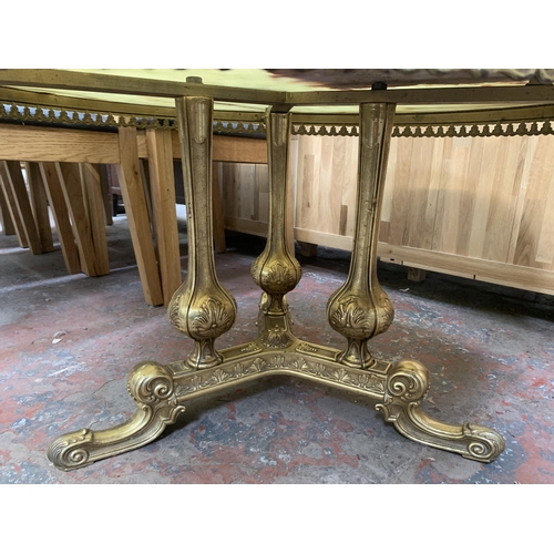 143 - A Rococo style onyx and gilt metal circular tripod coffee table - approx. 50cm high x 90cm diameter