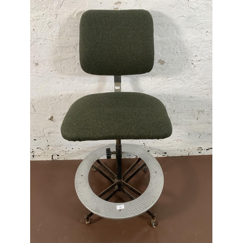 146 - A mid 20th century Tan-Sad green fabric upholstered and steel industrial factory adjustable swivel d... 