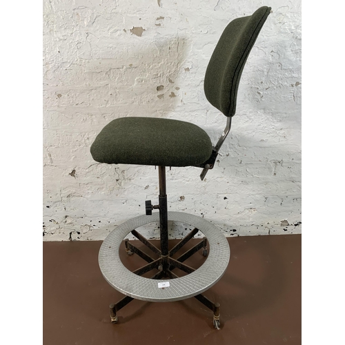 146 - A mid 20th century Tan-Sad green fabric upholstered and steel industrial factory adjustable swivel d... 