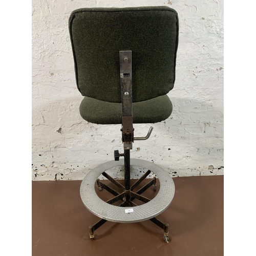 146 - A mid 20th century Tan-Sad green fabric upholstered and steel industrial factory adjustable swivel d... 