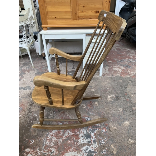 167 - A beech spindle back farmhouse rocking chair