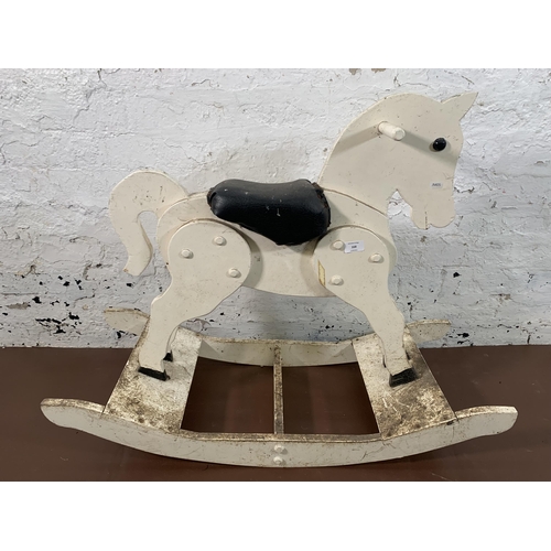 168 - Two vintage painted wooden rocking horses - largest approx. 73cm high