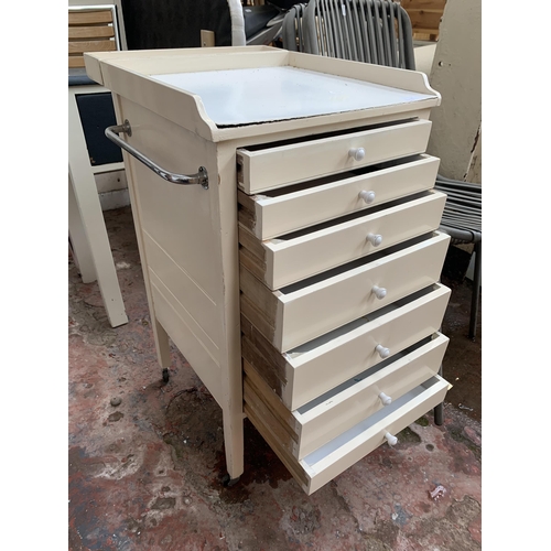 171 - A mid 20th century white painted seven drawer kitchen trolley island on castors - approx. 80cm high ... 