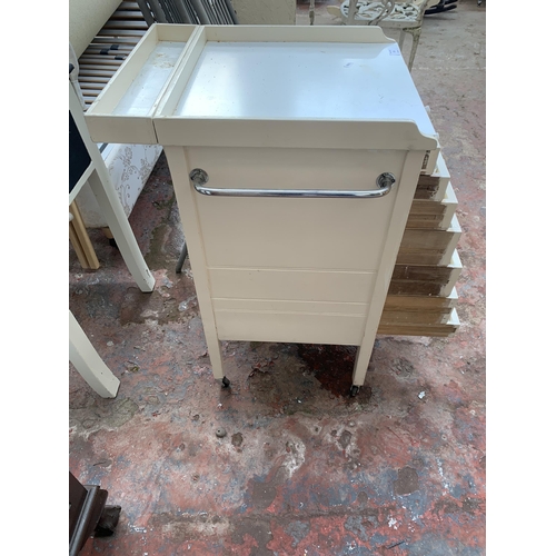 171 - A mid 20th century white painted seven drawer kitchen trolley island on castors - approx. 80cm high ... 