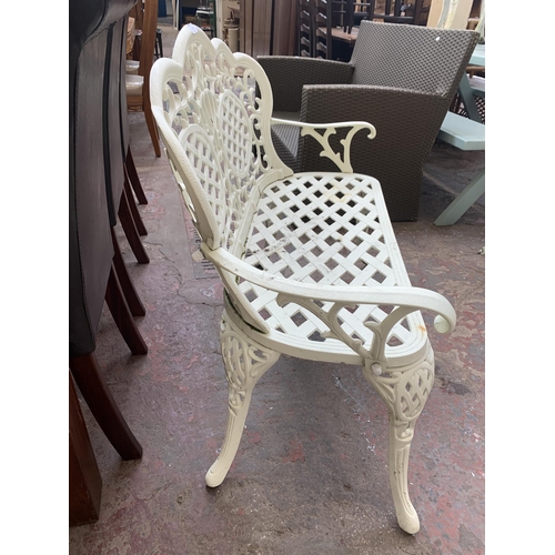 173 - A Victorian style white painted cast metal two seater garden bench - approx. 89cm high x 108cm wide ... 