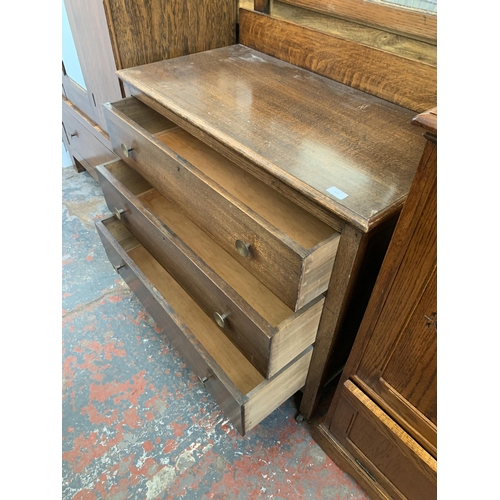 178 - An early 20th century oak dressing chest with upper bevelled edge mirror - approx. 149cm high x 93cm... 