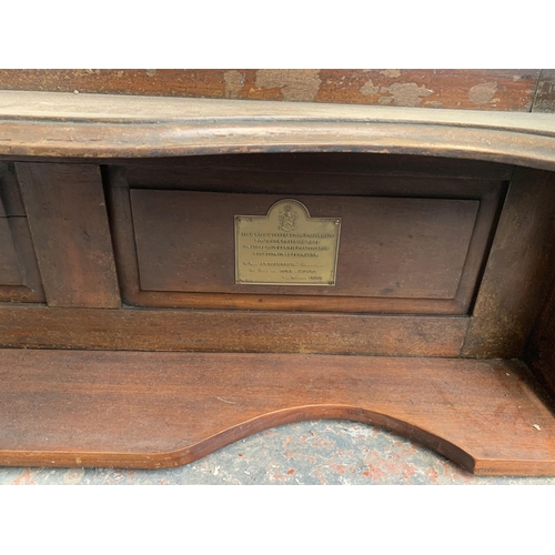 185 - A Victorian carved mahogany over mantle mirror with two brass plaques - approx. 114cm high x 120cm w... 