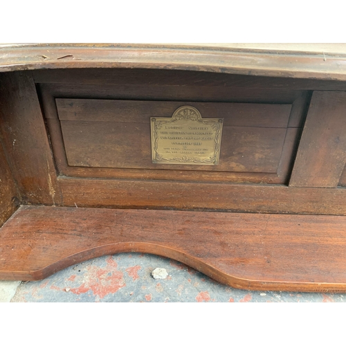 185 - A Victorian carved mahogany over mantle mirror with two brass plaques - approx. 114cm high x 120cm w... 