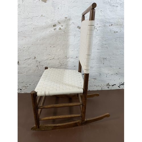 198 - An early 20th century oak and white cotton rocking chair - approx. 89cm high x 49cm wide x 65cm deep