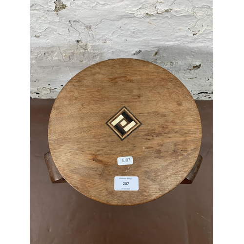 207 - An Art Deco inlaid mahogany and bentwood circular two tier side table - approx. 42cm high x 27cm dia... 