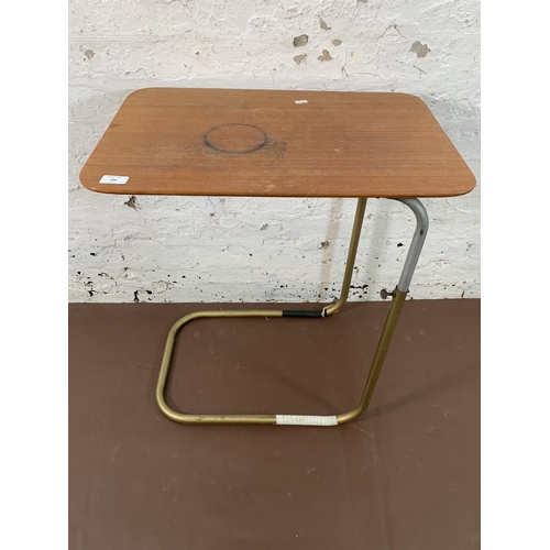 208 - A mid 20th century teak and tubular metal adjustable table - approx. 70cm high x 39cm wide x 60cm lo... 