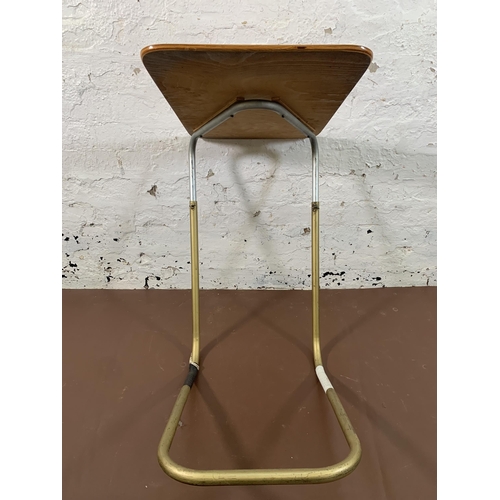 208 - A mid 20th century teak and tubular metal adjustable table - approx. 70cm high x 39cm wide x 60cm lo... 