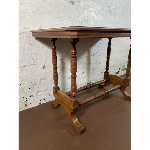 215 - A Victorian mahogany writing table with black leather insert - approx. 74cm high x 99cm wide x 61cm ... 