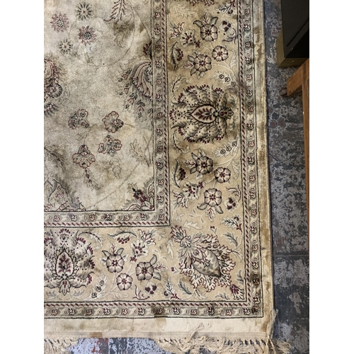 216 - A modern floral pattern rug - approx. 300cm x 200cm