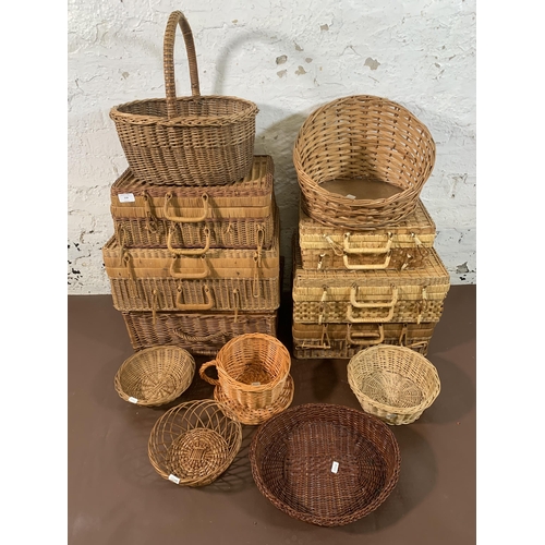 218 - Thirteen wicker baskets