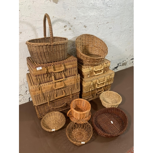 218 - Thirteen wicker baskets