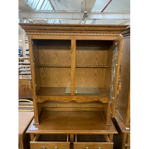 220 - An oak dresser - approx. 200cm high x 106cm wide x 46cm deep