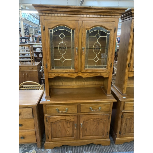 220 - An oak dresser - approx. 200cm high x 106cm wide x 46cm deep