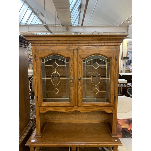 221 - An oak dresser - approx. 200cm high x 106cm wide x 46cm deep