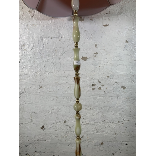 225 - An onyx and gilt metal standard lamp - approx. 171cm high