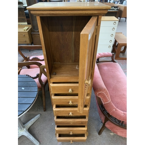 229 - An Indian hardwood cabinet - approx. 141cm high x 42cm wide x 28cm deep