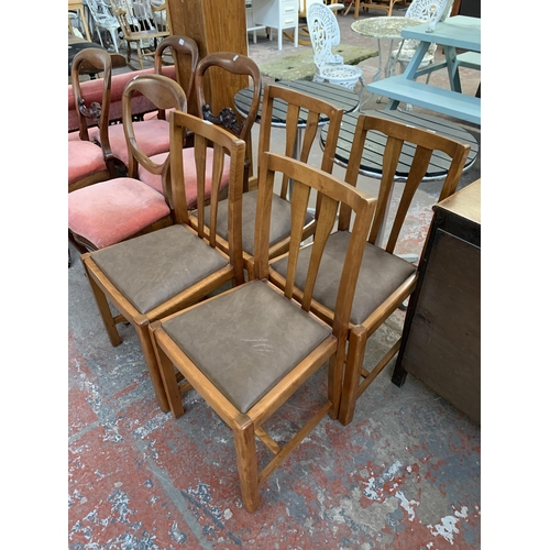 231 - Four mid 20th century beech dining chairs