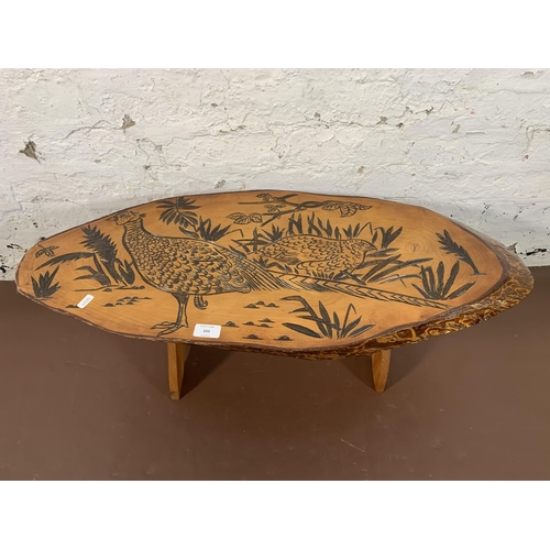 233 - A carved elm live edge coffee table - approx. 35cm high x 36cm wide x 87cm long