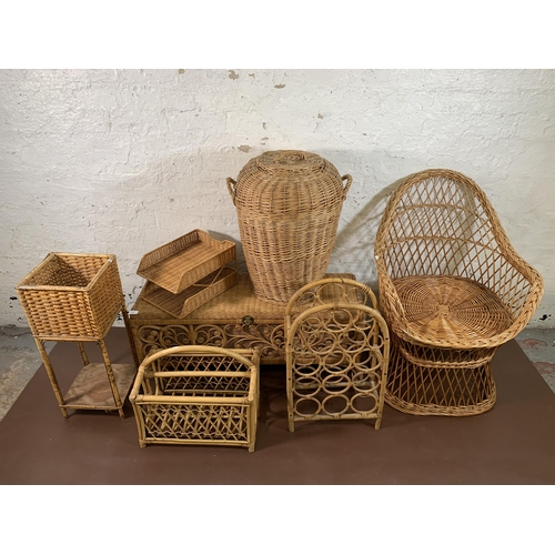 236 - Seven pieces of wicker furniture to include magazine rack, blanket box, jardiniere stand, bottle rac... 