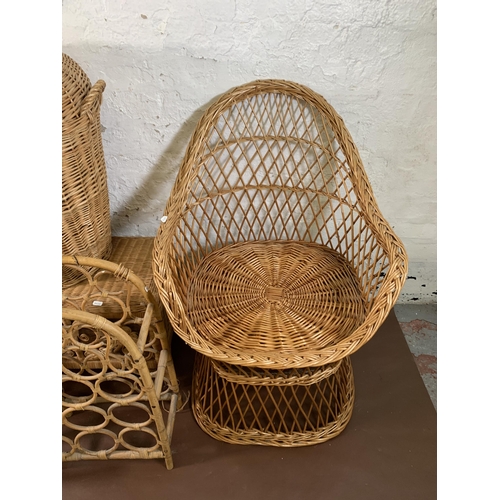 236 - Seven pieces of wicker furniture to include magazine rack, blanket box, jardiniere stand, bottle rac... 