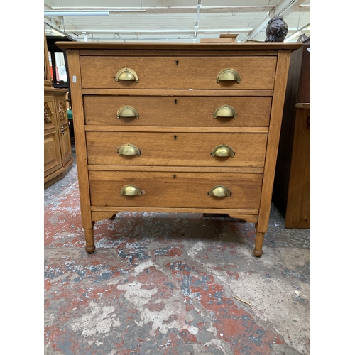 241 - An Edwardian oak chest of drawers = approx. 92cm high x 91cm wide x 46cm deep