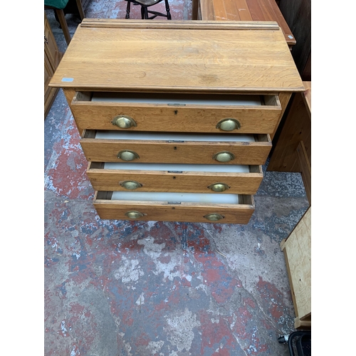 241 - An Edwardian oak chest of drawers = approx. 92cm high x 91cm wide x 46cm deep