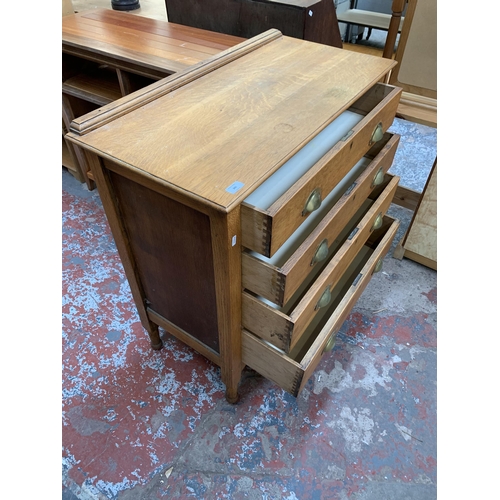 241 - An Edwardian oak chest of drawers = approx. 92cm high x 91cm wide x 46cm deep