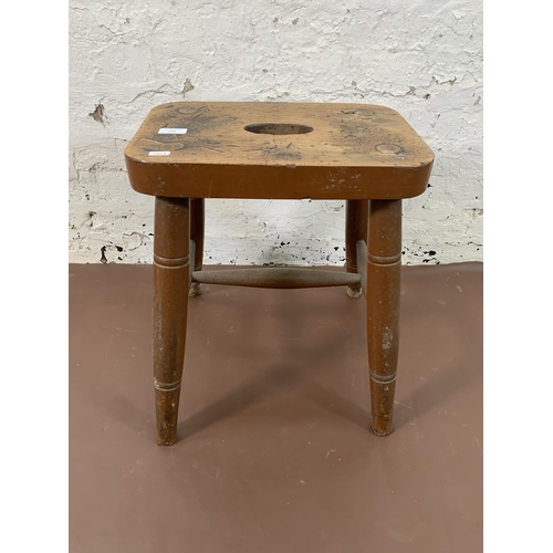 242 - A Victorian elm and beech farmhouse stool - approx. 48cm high x 40cm wide x 26cm deep