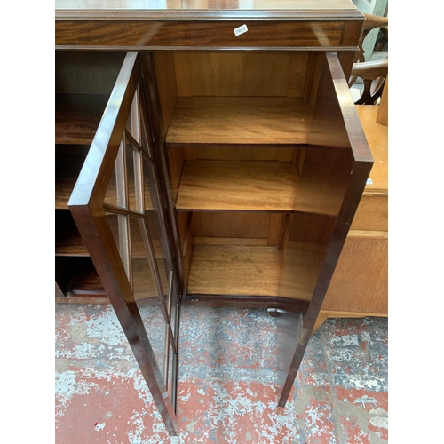 247 - A Harrops Better Furniture of Manchester mahogany display cabinet on cabriole supports - approx. 127... 