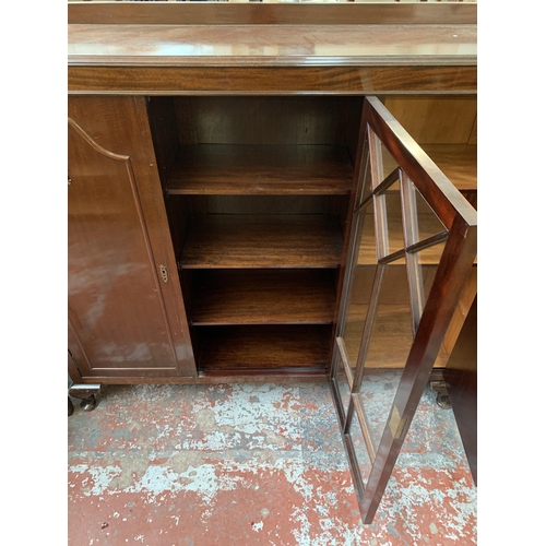 247 - A Harrops Better Furniture of Manchester mahogany display cabinet on cabriole supports - approx. 127... 