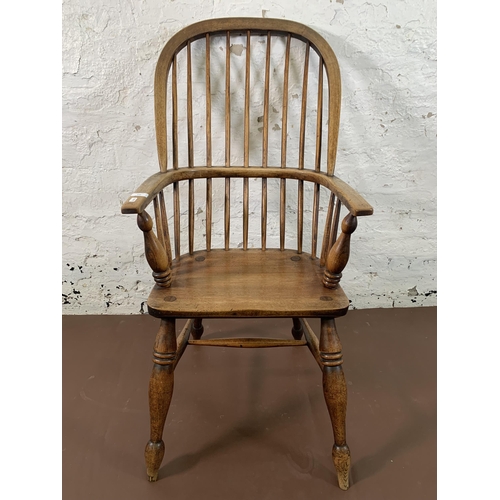 250 - A 19th century elm and beech Windsor chair - approx. 108cm high x 56cm wide x 37cm deep