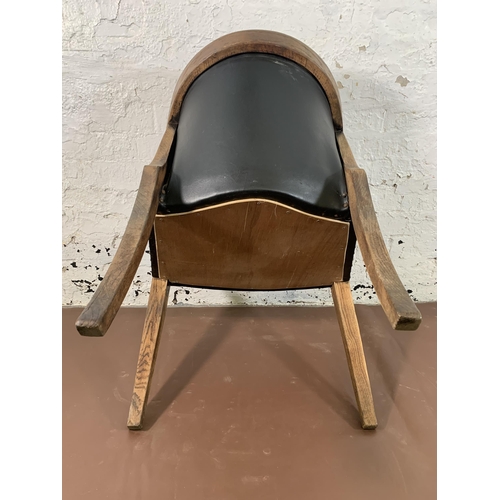 256 - An early/mid 20th century oak and black vinyl desk chair - approx. 78cm high x 55cm wide x 53cm deep